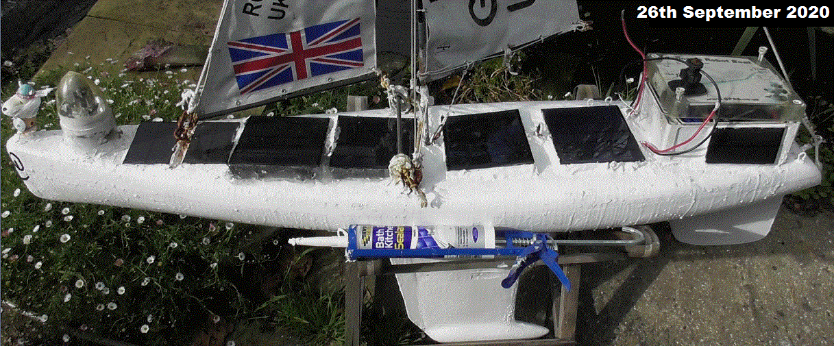 Snoopy Sloop 11 and solar panel glue drying